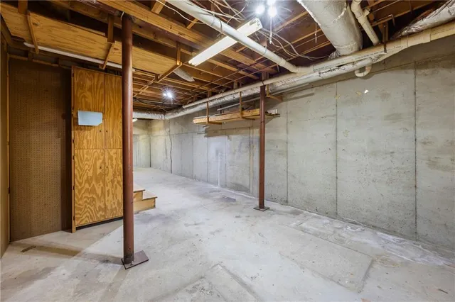 a picture of a bathroom with a shower