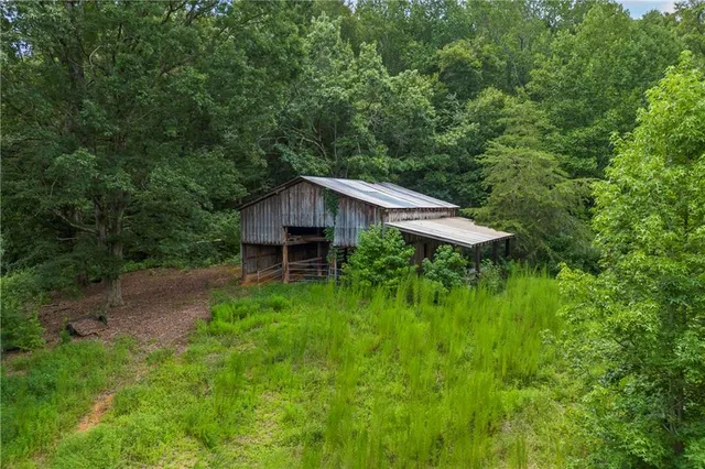 a view of a play room with furniture and toys