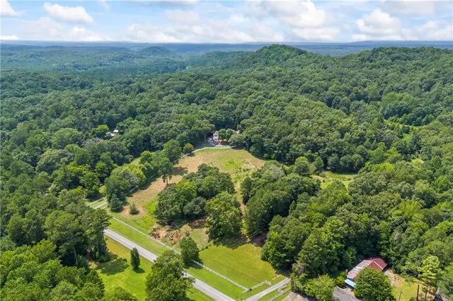 a view of a kitchen with a large window