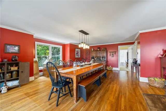 a bathroom with a sink a mirror and a toilet