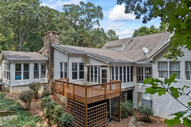 a view of a backyard with potted plants