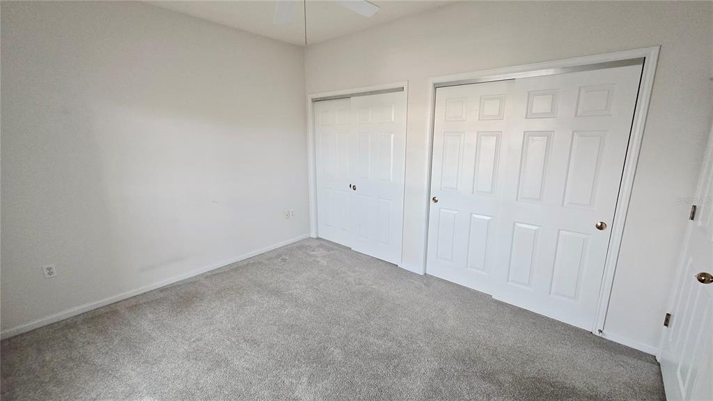 791 Celebration Avenue, Unit 791 Celebration, FL 34747 - Photo 20 of 27 a view of an empty room and closet area