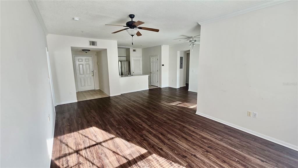 791 Celebration Avenue, Unit 791 Celebration, FL 34747 - Photo 4 of 27 a view of entryway with wooden floor
