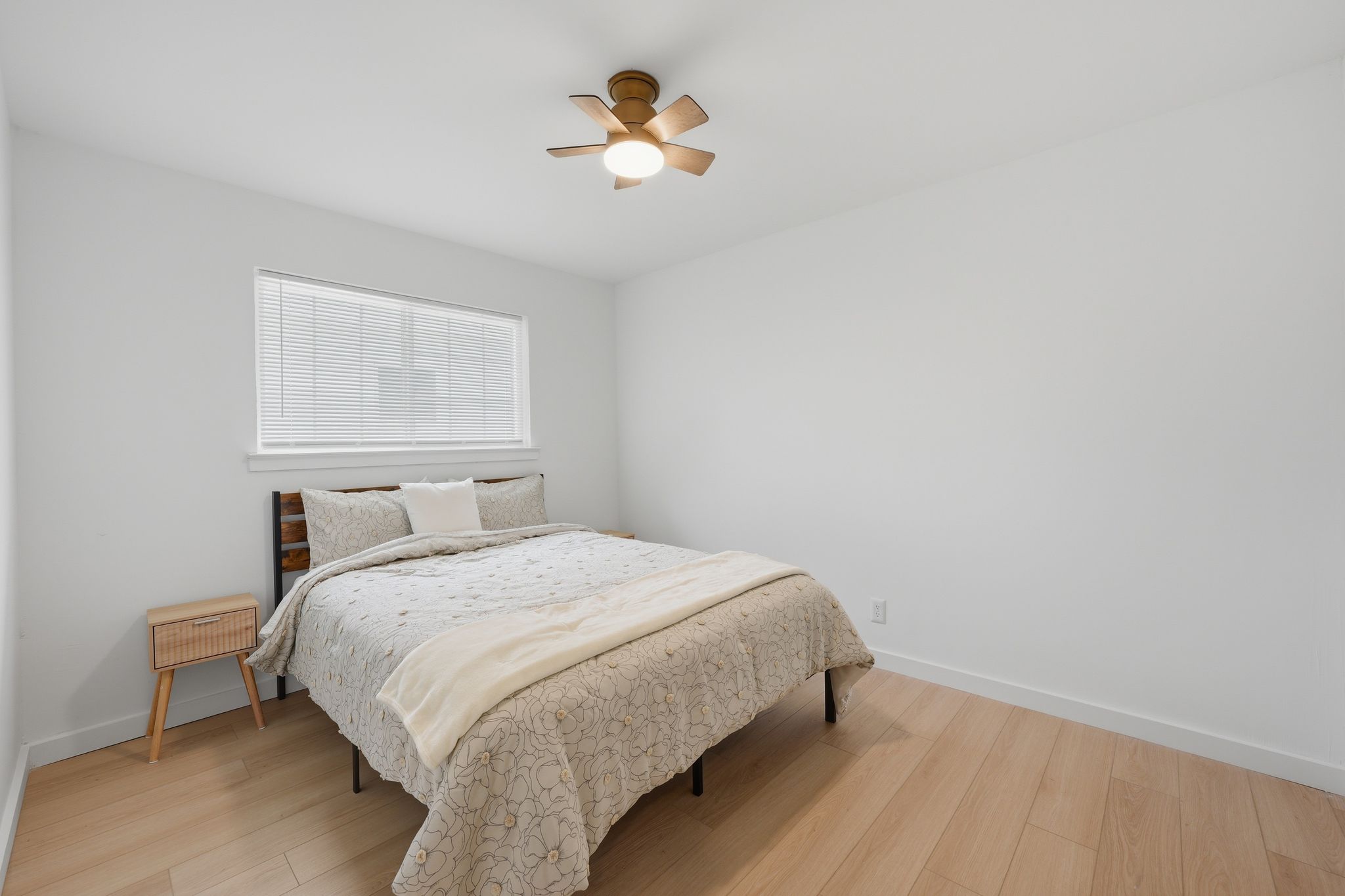 6804 Meadow Run Austin, TX 78745 - Photo 16 of 34 a bedroom with a bed and a chandelier