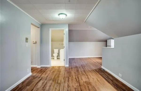 a view of a room with racks on the wall