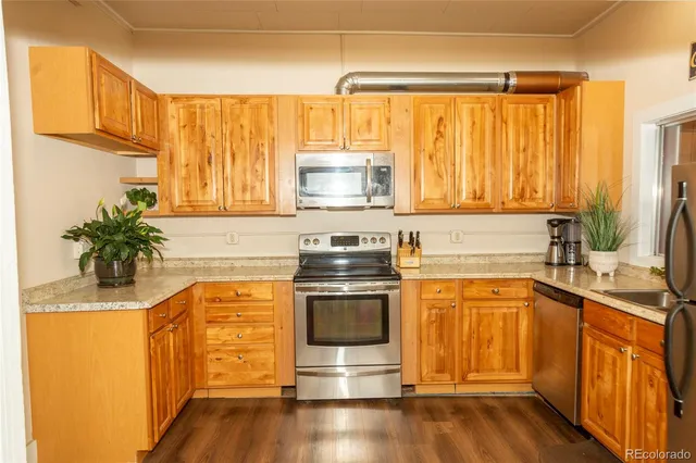 a sign that is on a wall next to a window