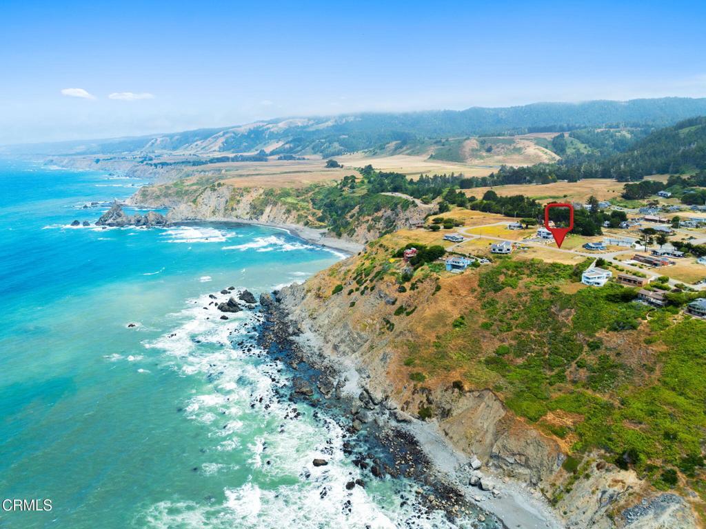 14790 Navarro Way Manchester, CA 95459 - Photo 6 of 26 a view of lake with mountain