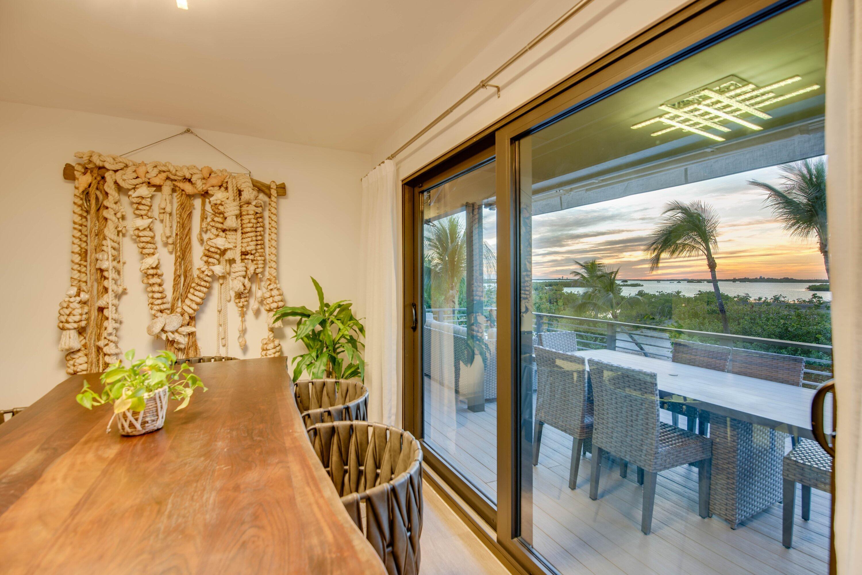 1422 Boca Chica Road Key West, FL 33040 - Photo 13 of 54 a view of a balcony with furniture