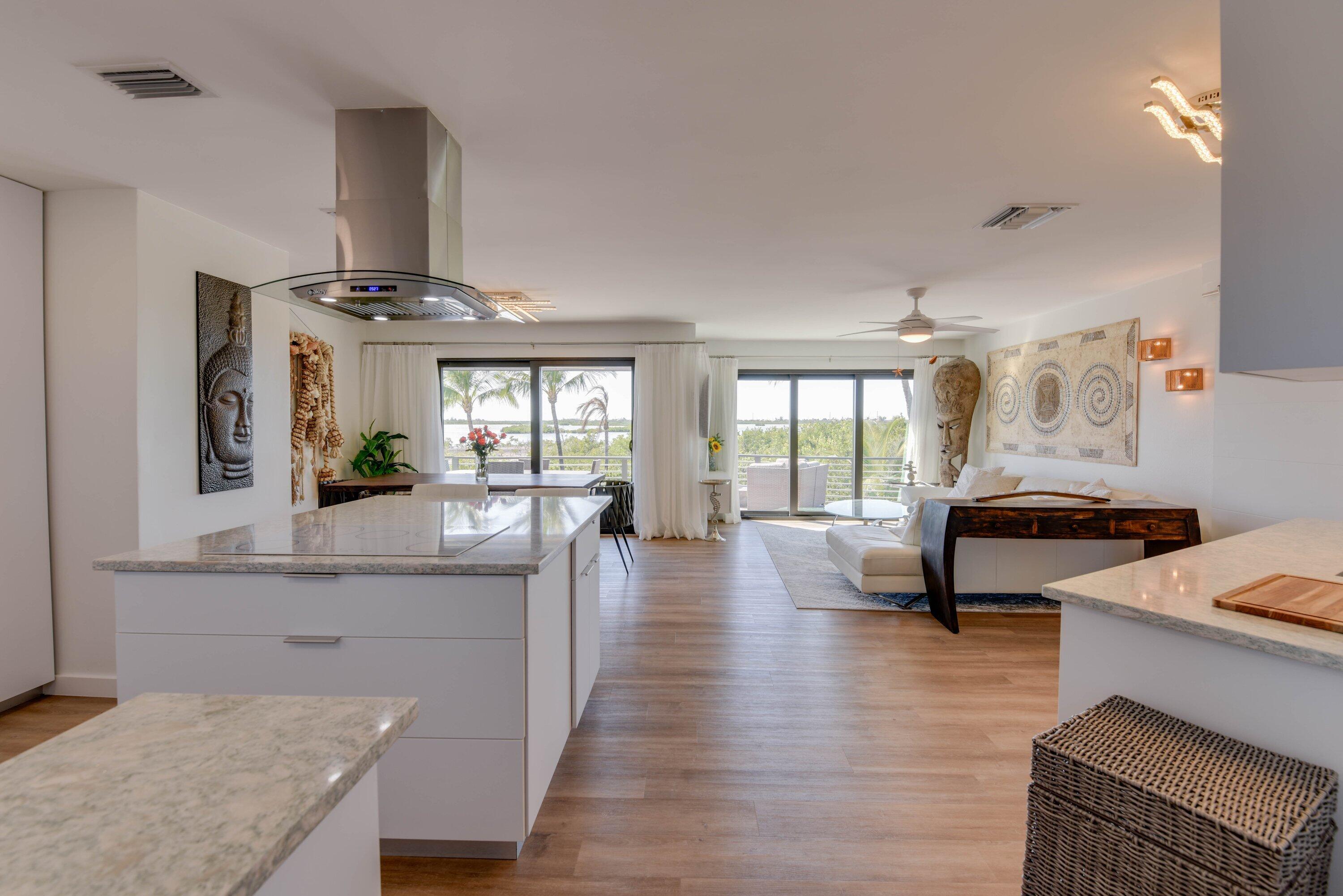 1422 Boca Chica Road Key West, FL 33040 - Photo 15 of 54 a living room with furniture and a table