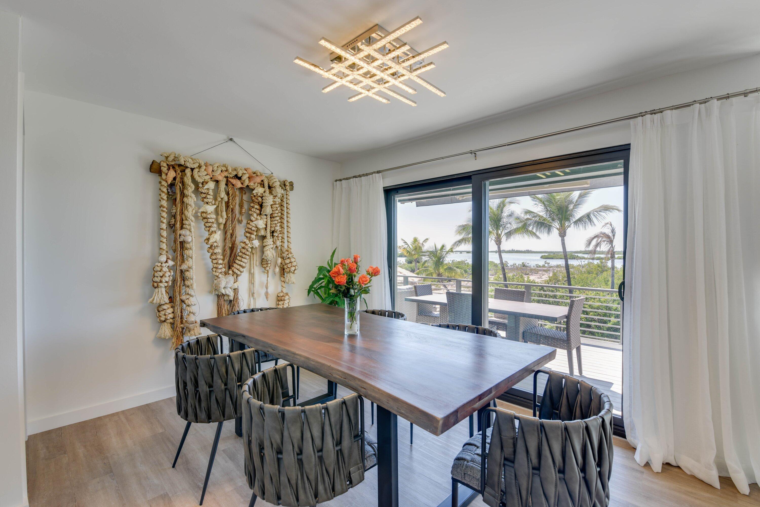 1422 Boca Chica Road Key West, FL 33040 - Photo 20 of 54 a view of a dining room with furniture window and outside view