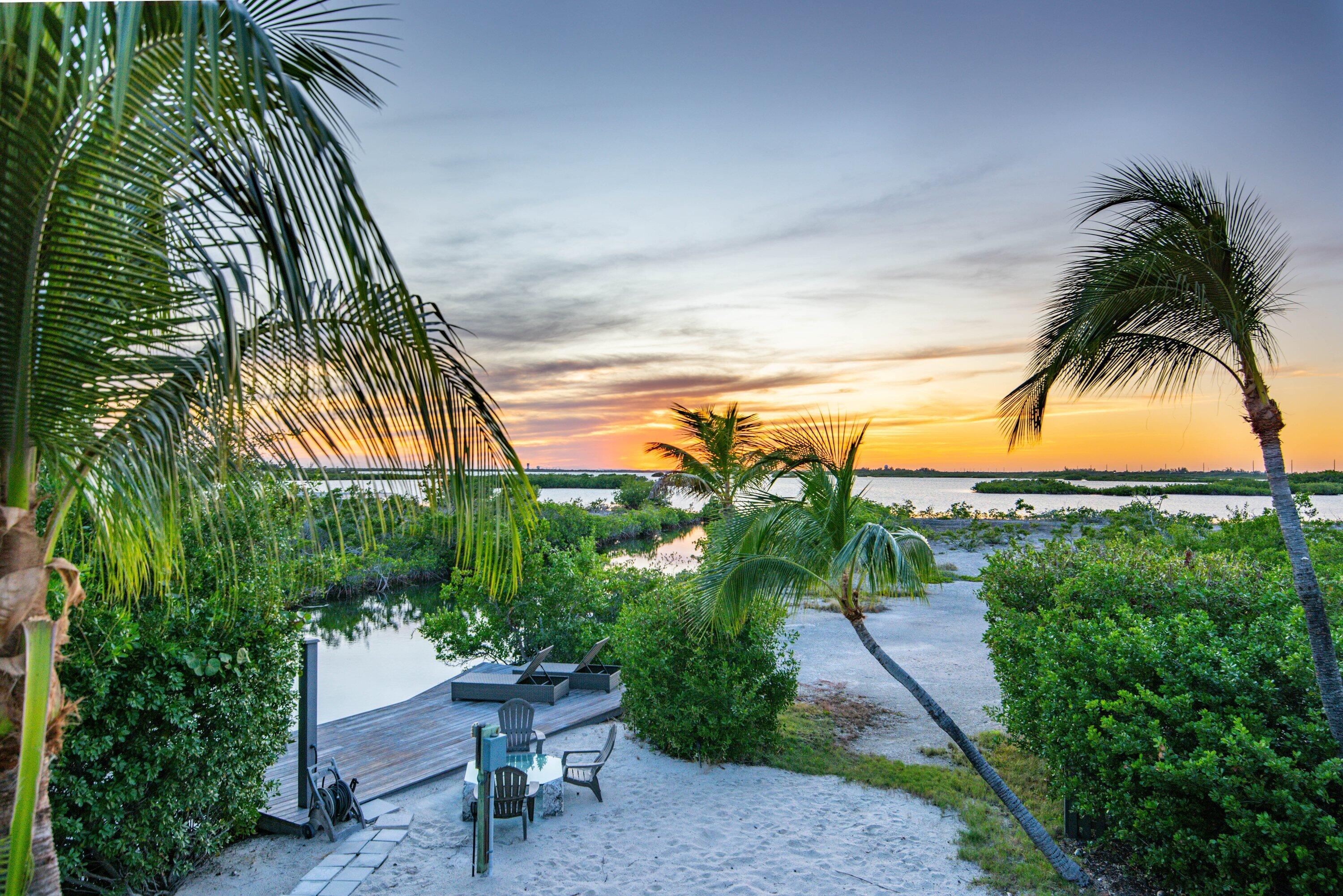 1422 Boca Chica Road Key West, FL 33040 - Photo 2 of 54 a view of a backyard with a garden