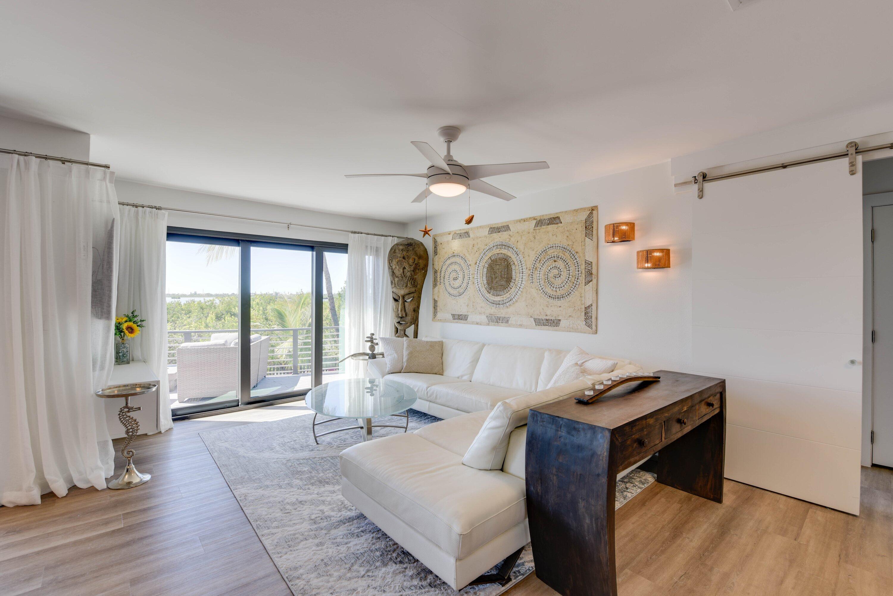 1422 Boca Chica Road Key West, FL 33040 - Photo 21 of 54 a living room with furniture and a large window