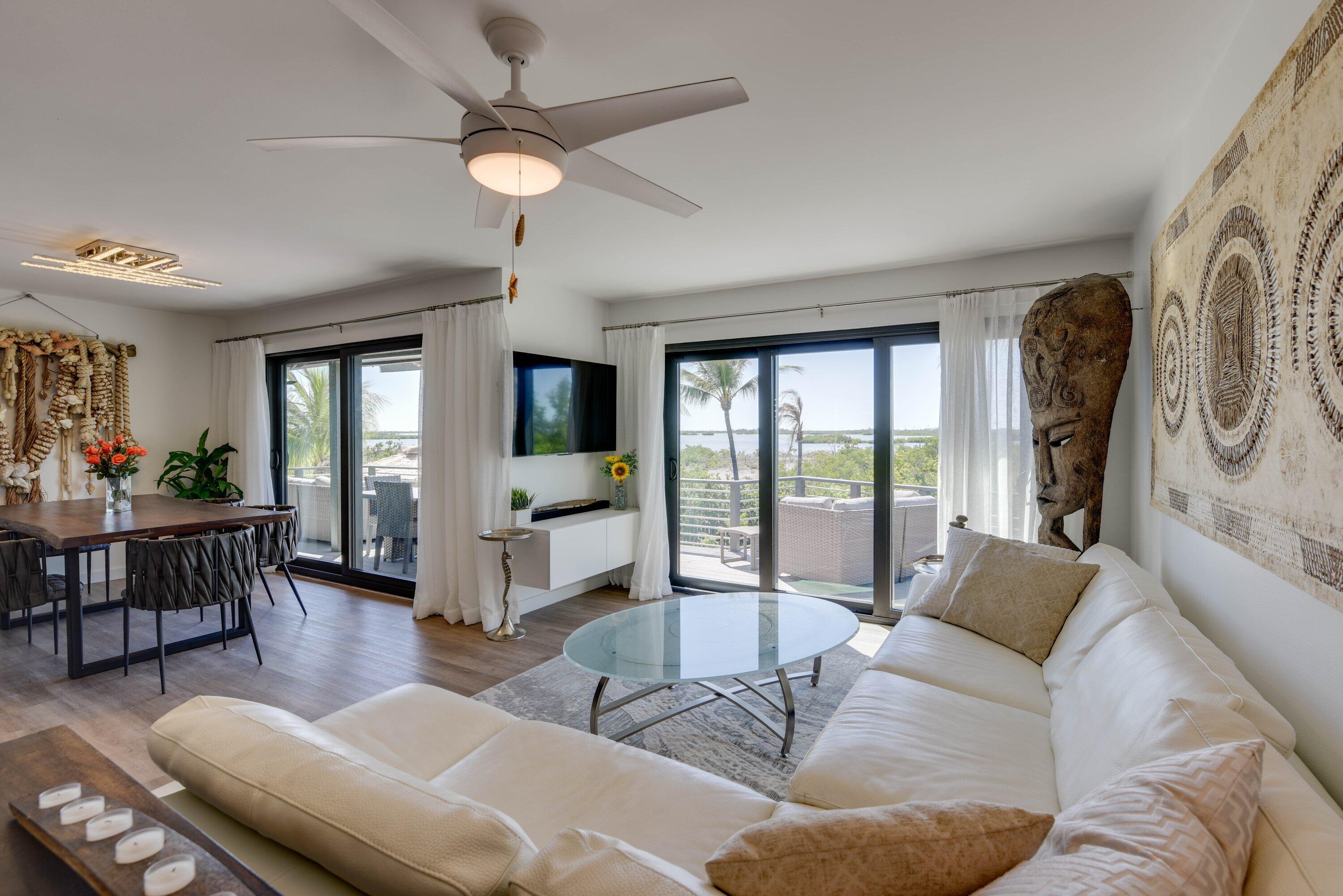 1422 Boca Chica Road Key West, FL 33040 - Photo 22 of 54 a living room with furniture and a flat screen tv