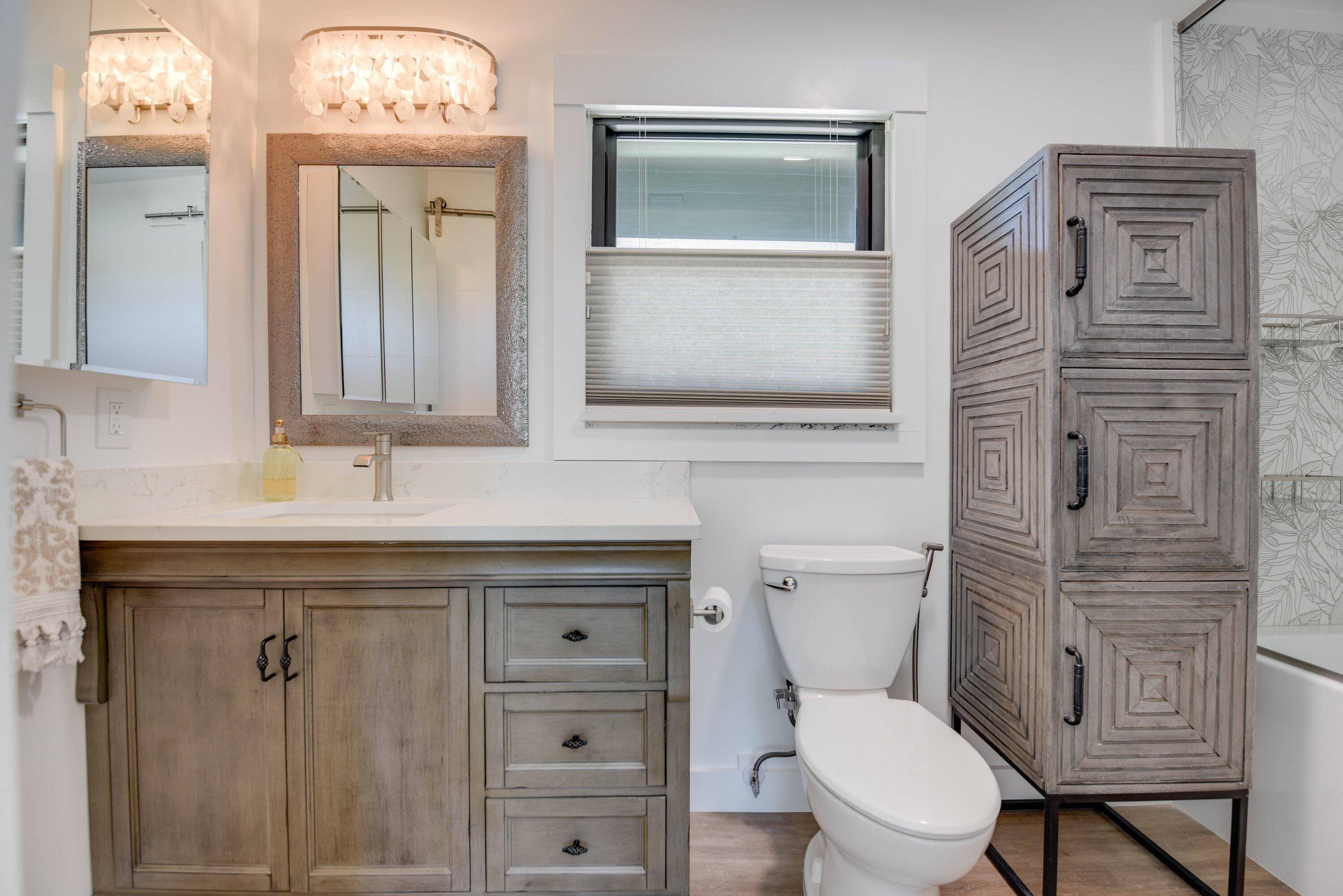 1422 Boca Chica Road Key West, FL 33040 - Photo 30 of 54 a bathroom with a toilet a sink a vanity and mirror