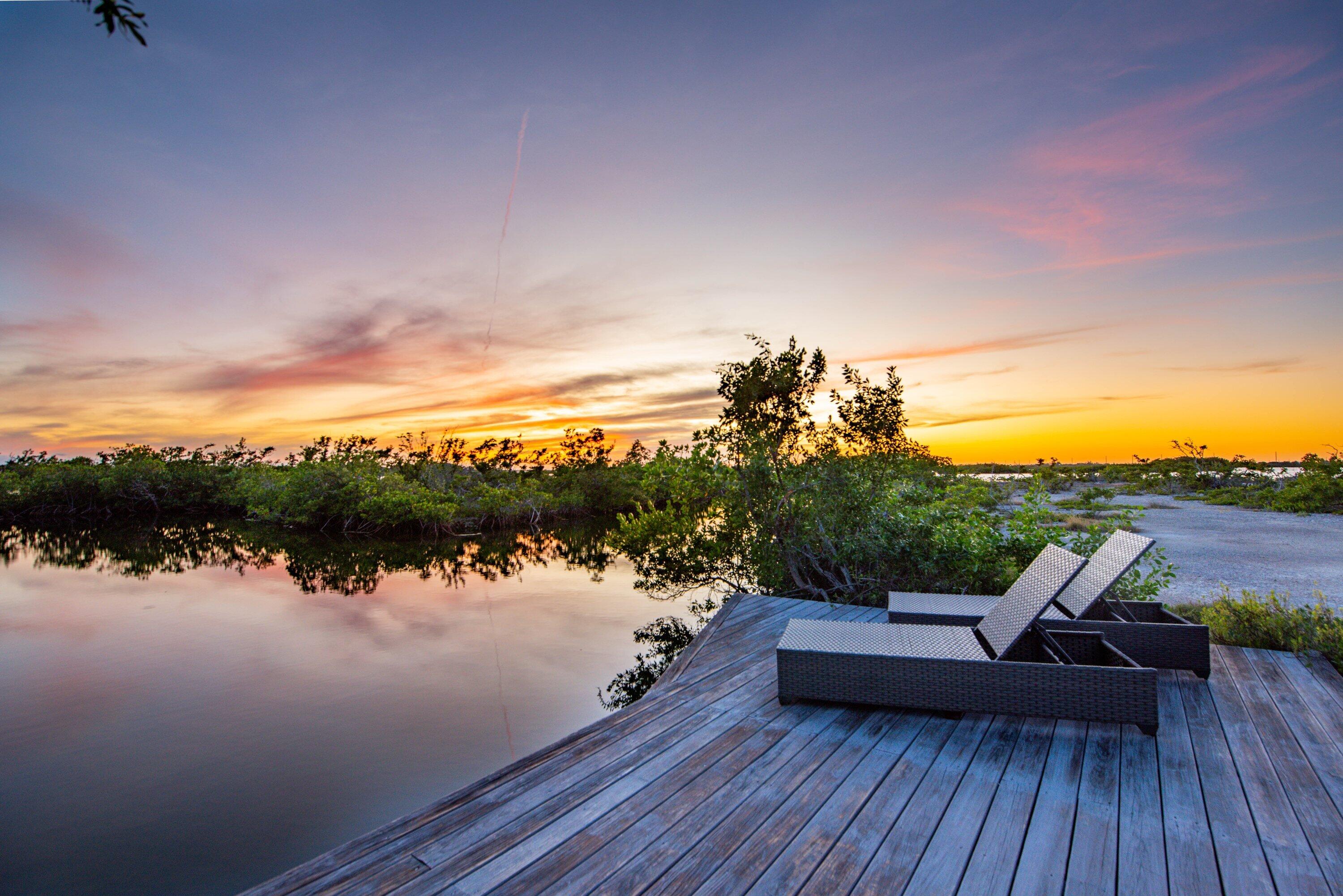 1422 Boca Chica Road Key West, FL 33040 - Photo 3 of 54 a view of a terrace with outdoor seating and water view