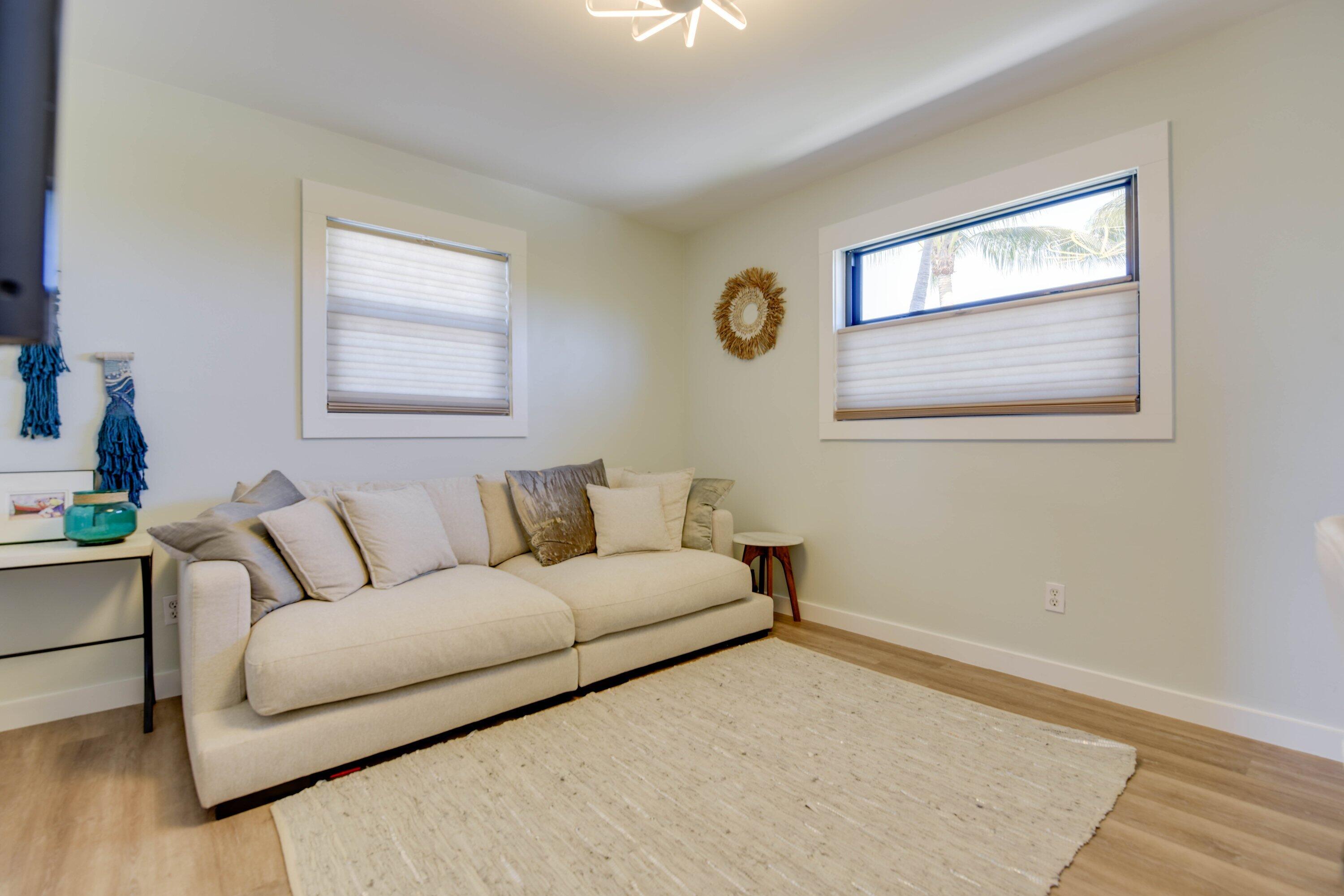 1422 Boca Chica Road Key West, FL 33040 - Photo 34 of 54 a living room with a couch and a window