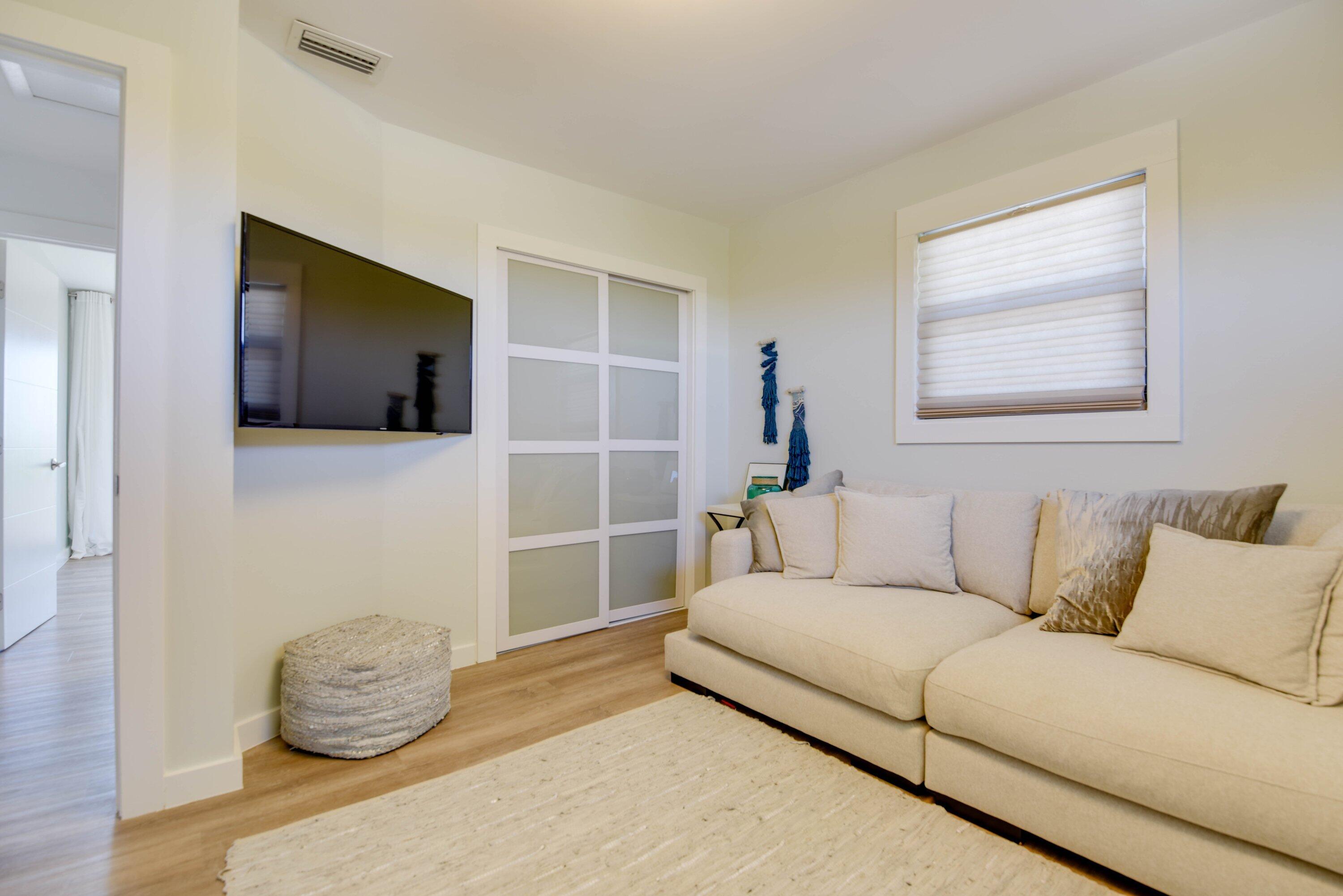 1422 Boca Chica Road Key West, FL 33040 - Photo 35 of 54 a living room with furniture and a flat screen tv