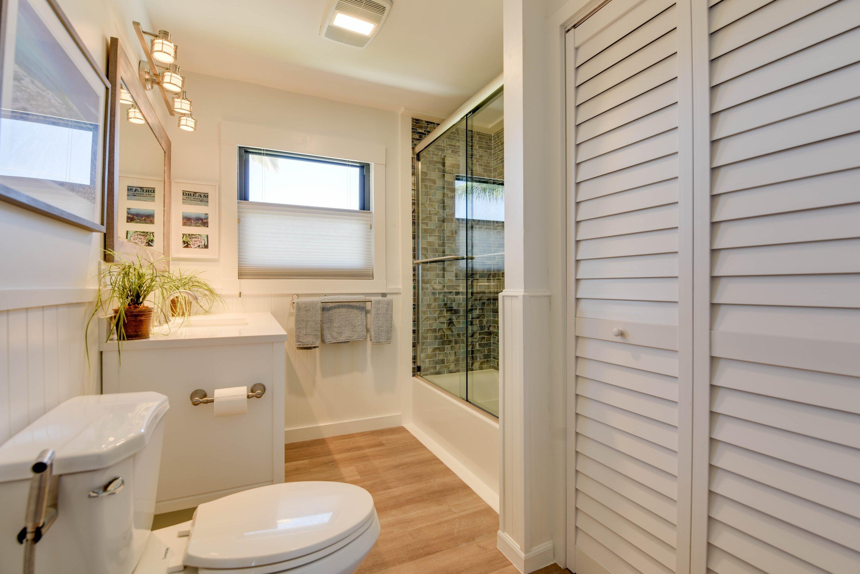 1422 Boca Chica Road Key West, FL 33040 - Photo 38 of 54 a bathroom with a toilet a sink and shower