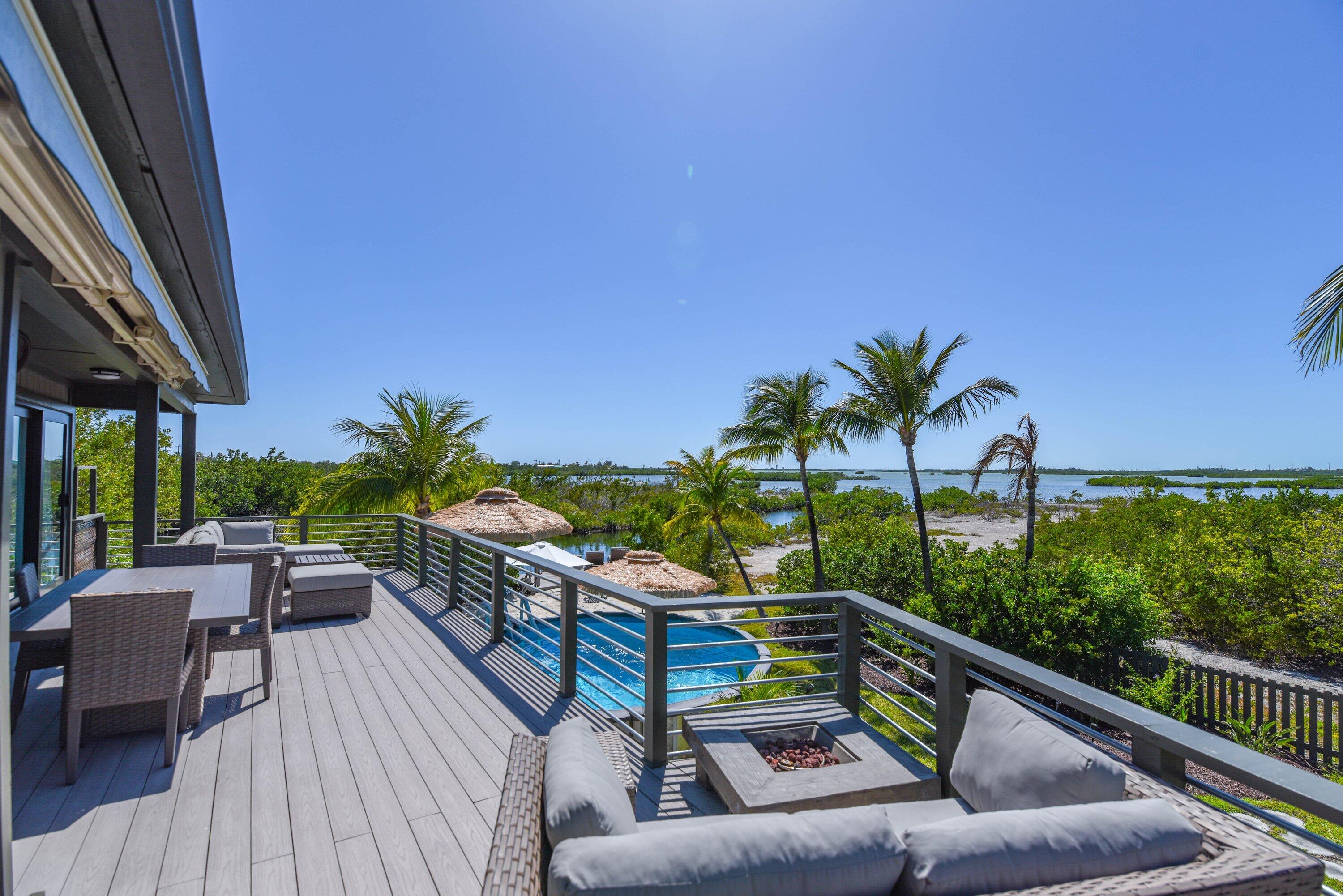 1422 Boca Chica Road Key West, FL 33040 - Photo 44 of 54 a view of swimming pool with outdoor seating and plants