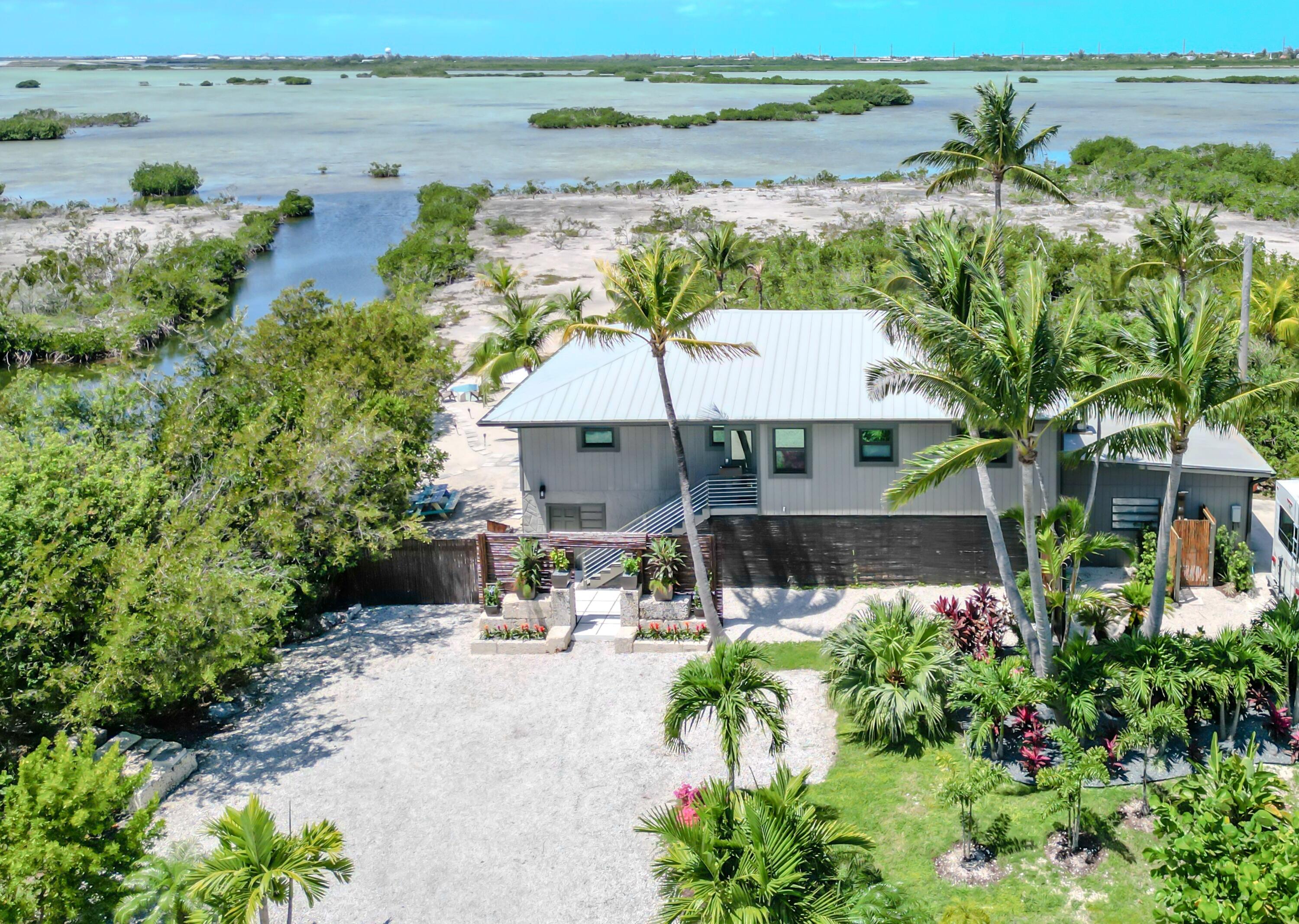 1422 Boca Chica Road Key West, FL 33040 - Photo 6 of 54 a view of a house with a yard and ocean view