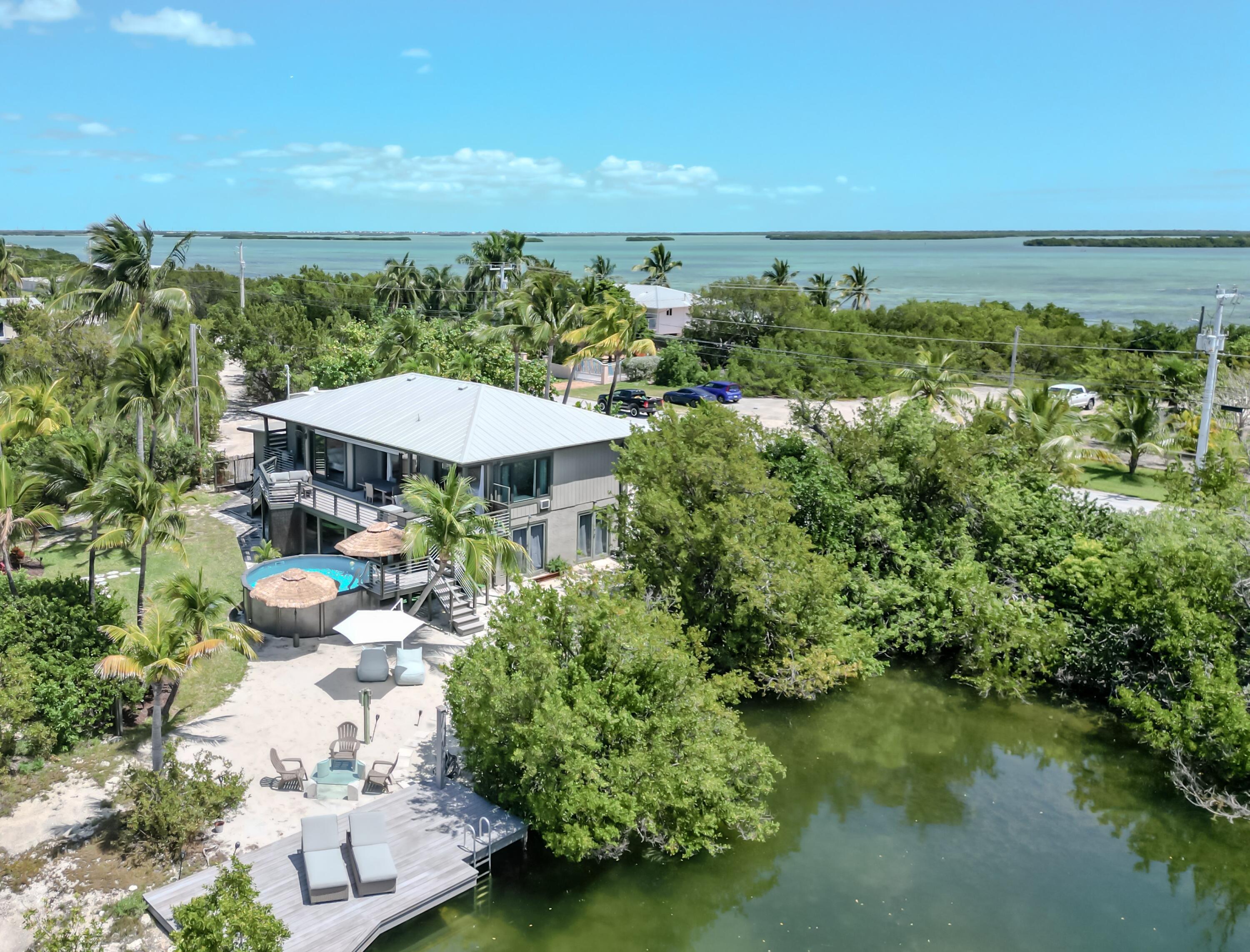 1422 Boca Chica Road Key West, FL 33040 - Photo 9 of 54 a view of a lake with a mountain in the background