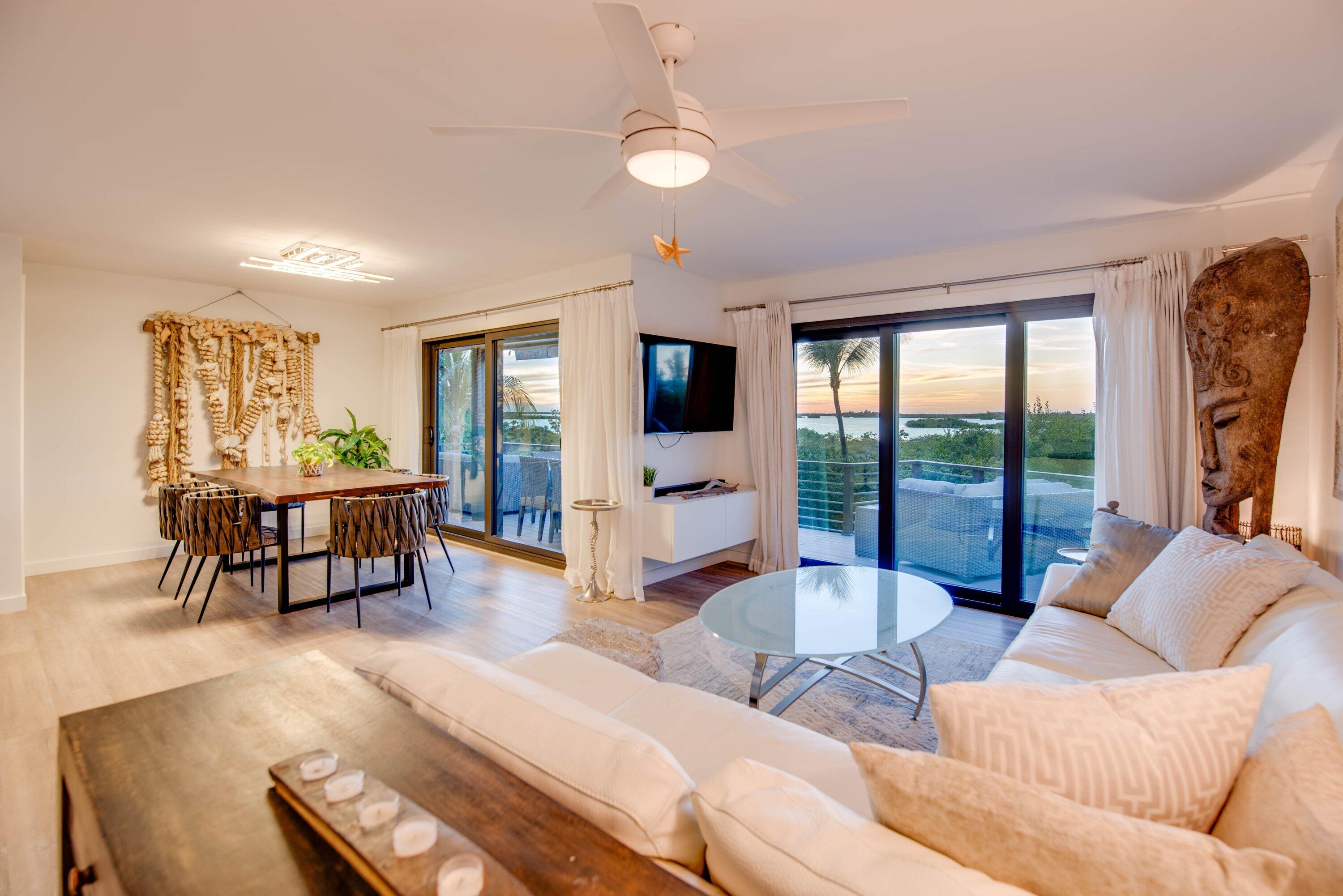 1422 Boca Chica Road Key West, FL 33040 - Photo 10 of 54 a living room with furniture and a flat screen tv