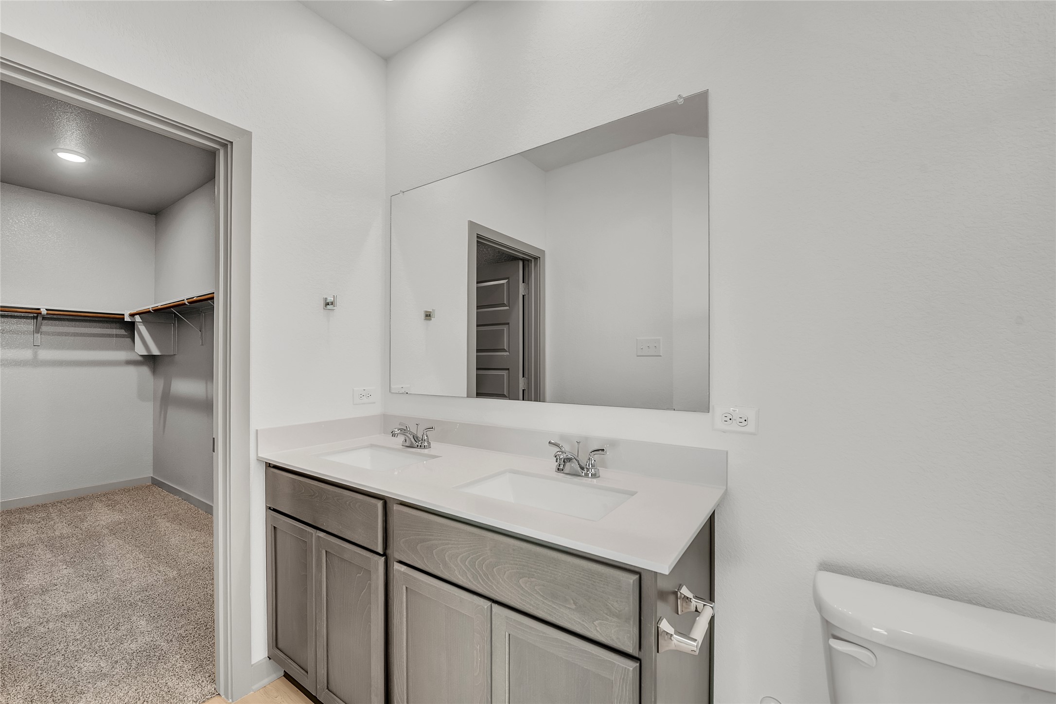 270 Boatright Boulevard Jarrell, TX 76537 - Photo 13 of 30 a bathroom with a sink vanity and a toilet