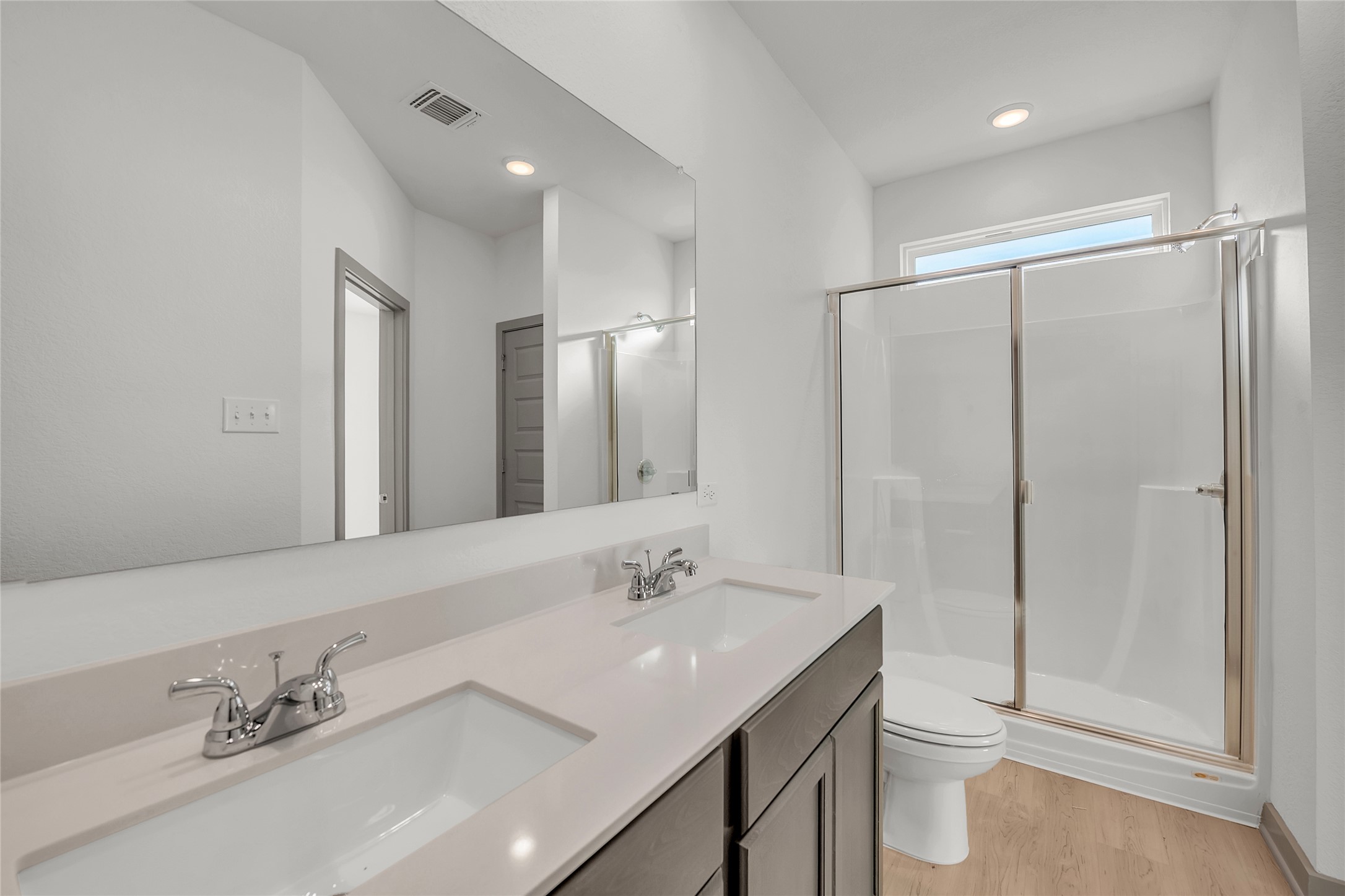 270 Boatright Boulevard Jarrell, TX 76537 - Photo 15 of 30 a bathroom with a granite countertop sink toilet and shower