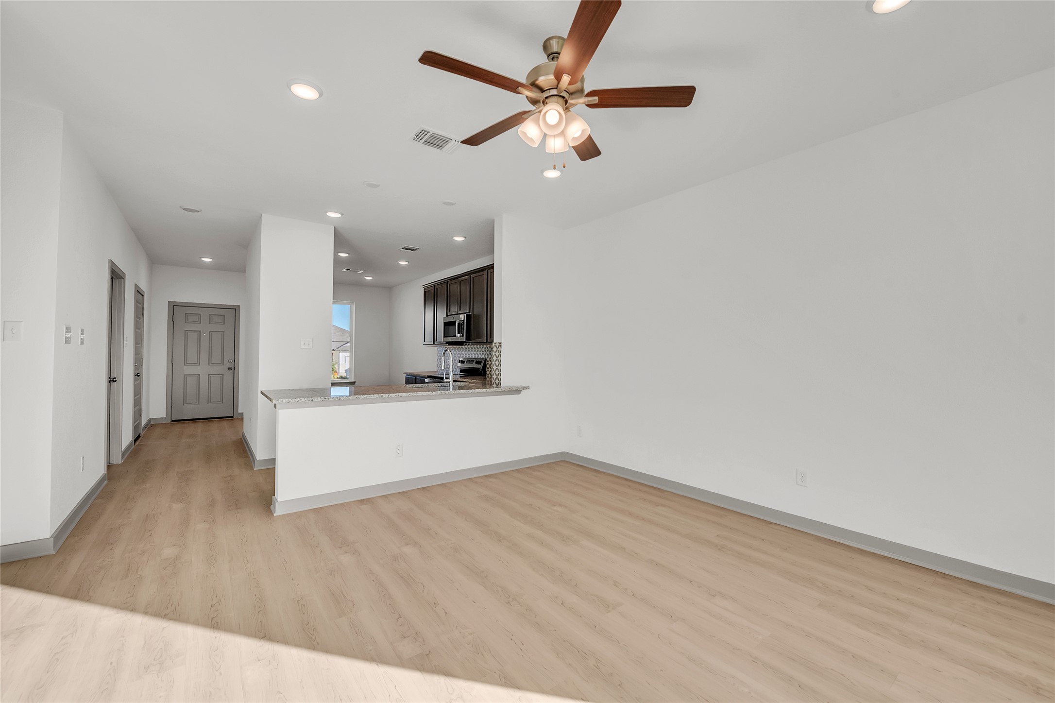 270 Boatright Boulevard Jarrell, TX 76537 - Photo 26 of 30 a view of kitchen with sink and wooden floor