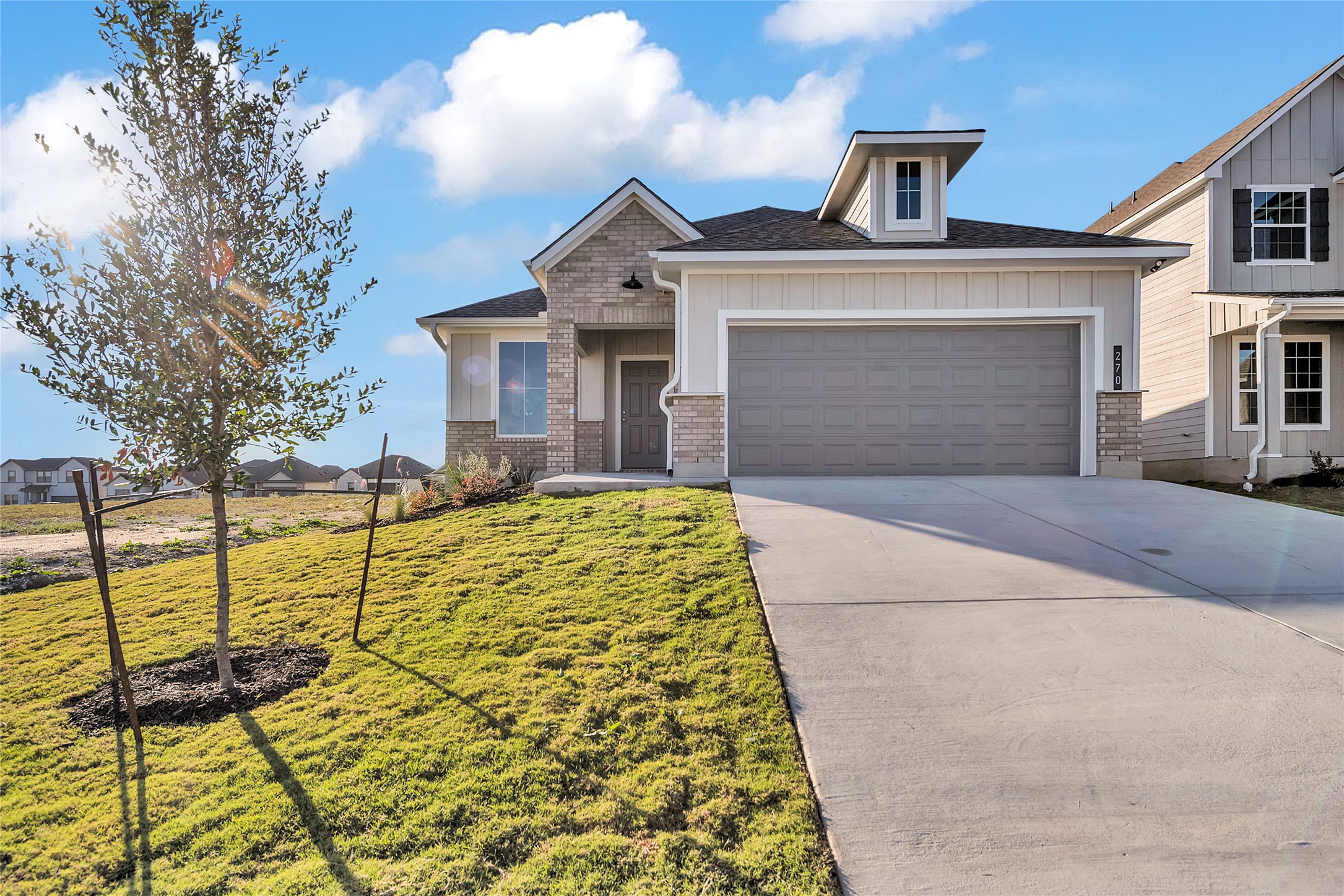 270 Boatright Boulevard Jarrell, TX 76537 - Photo 4 of 30 a front view of a house with yard