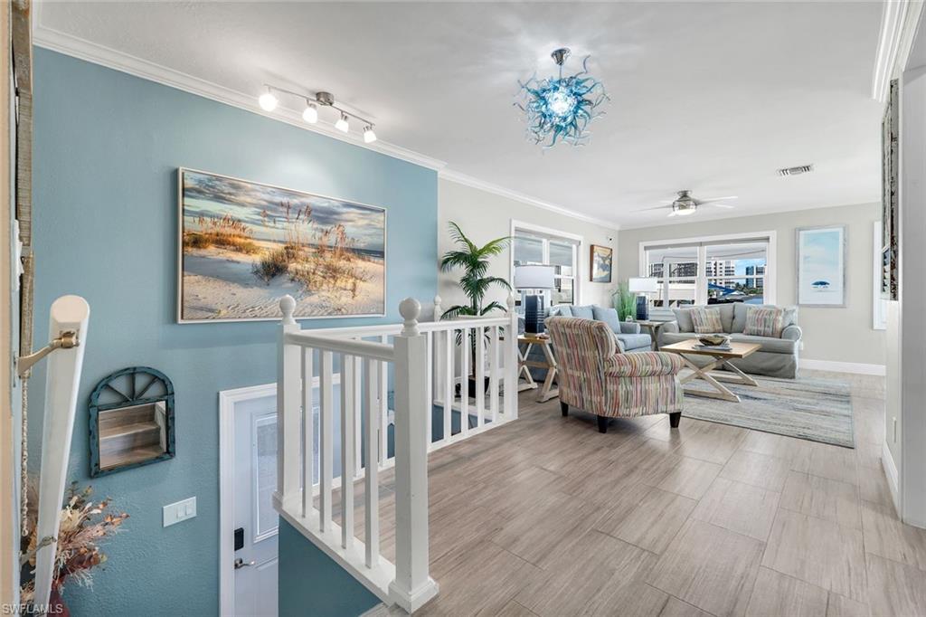 100 Tarpon Road Fort Myers Beach, FL 33931 - Photo 16 of 49 a living room with furniture and a large window