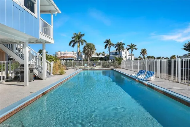 a view of a swimming pool with a terrace