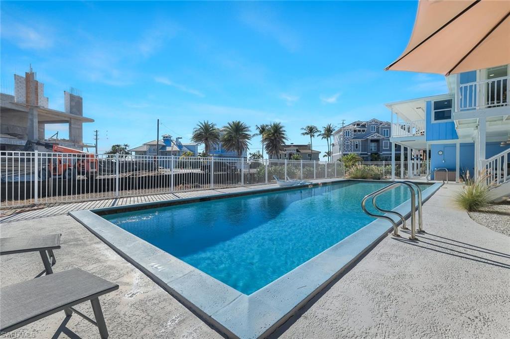 100 Tarpon Road Fort Myers Beach, FL 33931 - Photo 35 of 49 a view of a swimming pool with a terrace
