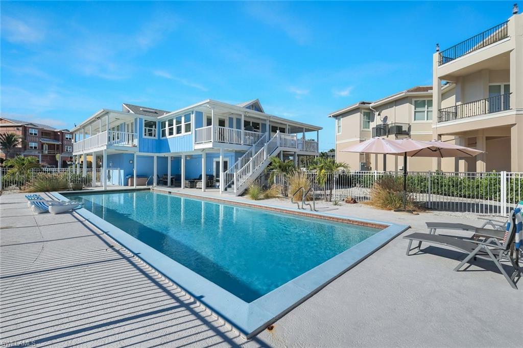 100 Tarpon Road Fort Myers Beach, FL 33931 - Photo 36 of 49 a view of a swimming pool with a patio