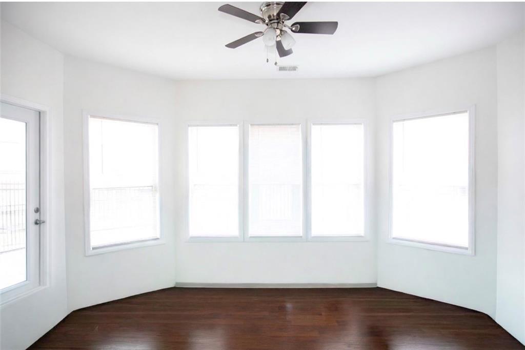 213 Oakleaf Drive Acworth, GA 30102 - Photo 13 of 24 a room with a window and a ceiling fan