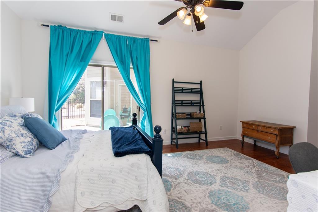 213 Oakleaf Drive Acworth, GA 30102 - Photo 15 of 24 a bedroom with furniture and a large window