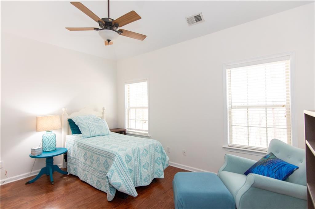 213 Oakleaf Drive Acworth, GA 30102 - Photo 20 of 24 a bedroom with a bed window and couch