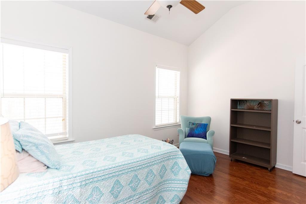 213 Oakleaf Drive Acworth, GA 30102 - Photo 21 of 24 a bedroom with a bed and a window