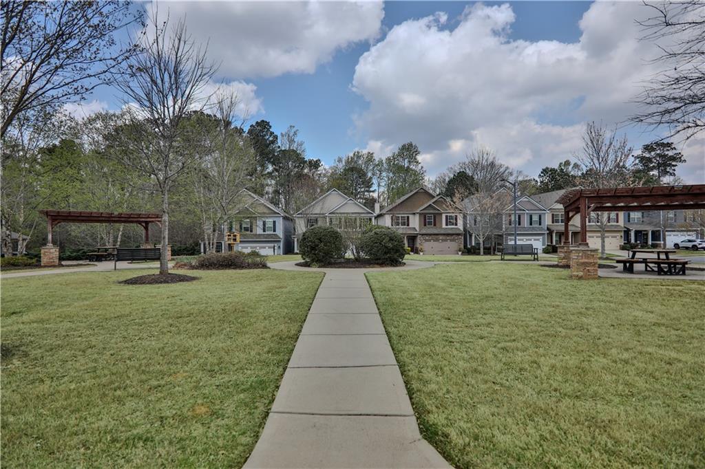 213 Oakleaf Drive Acworth, GA 30102 - Photo 24 of 24 a front view of a house with garden