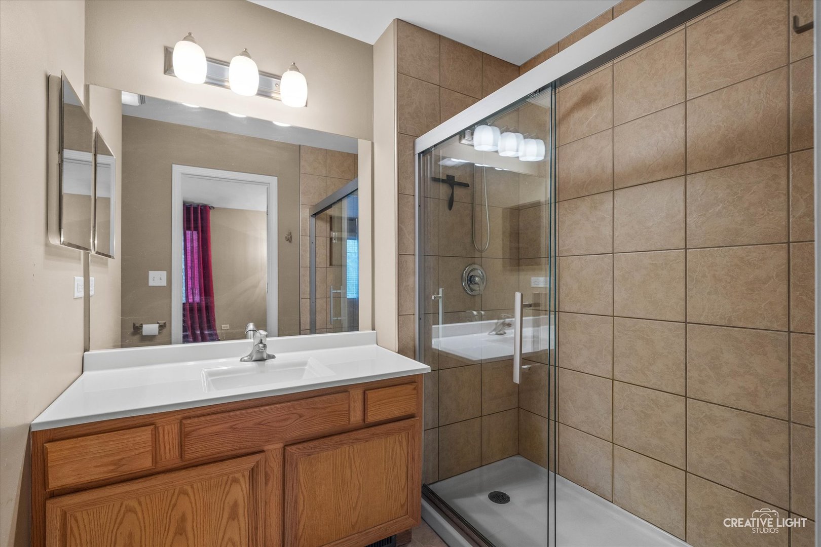 378 Lakeview Circle Bolingbrook, IL 60440 - Photo 13 of 19 a bathroom with a double vanity sink and a mirror