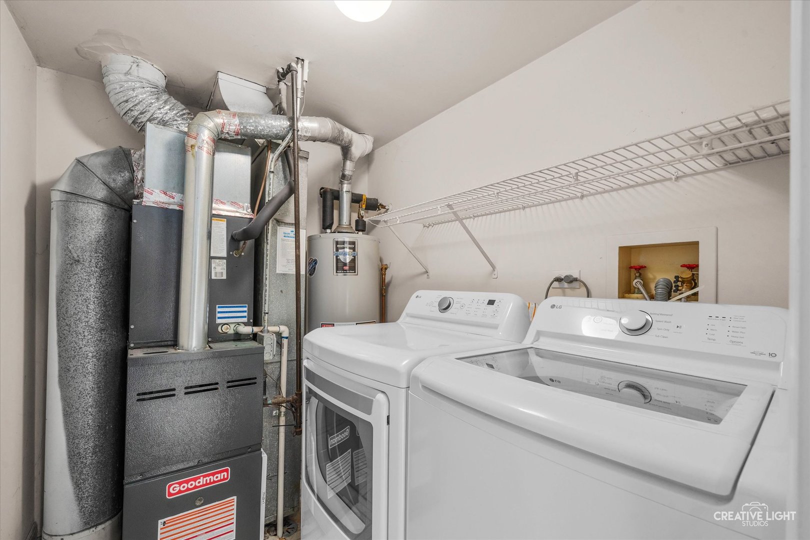 378 Lakeview Circle Bolingbrook, IL 60440 - Photo 14 of 19 a utility room with dryer and washer