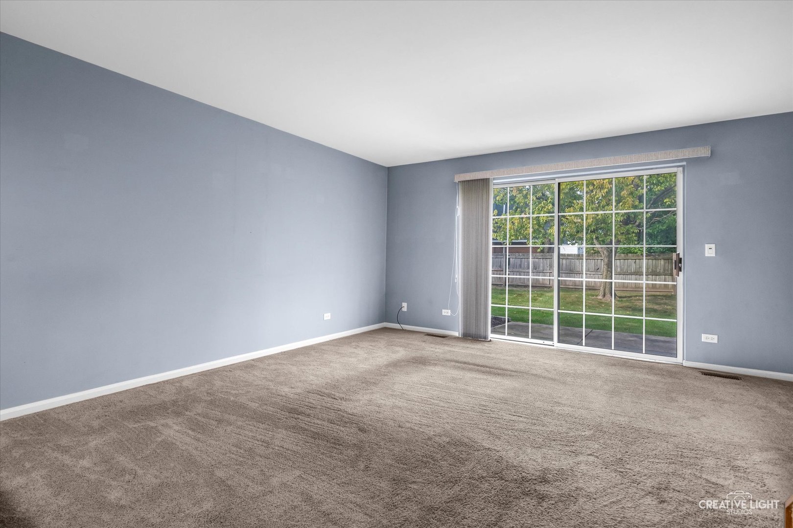 378 Lakeview Circle Bolingbrook, IL 60440 - Photo 3 of 19 a view of an empty room with a window