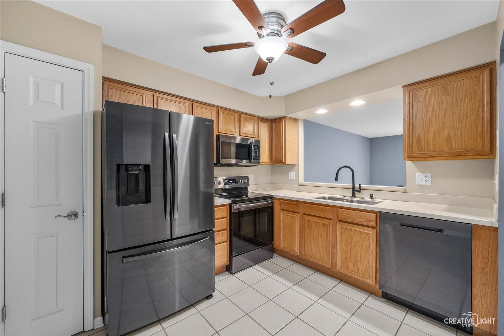 378 Lakeview Circle Bolingbrook, IL 60440 - Photo 7 of 19 a kitchen with stainless steel appliances granite countertop a refrigerator and a sink