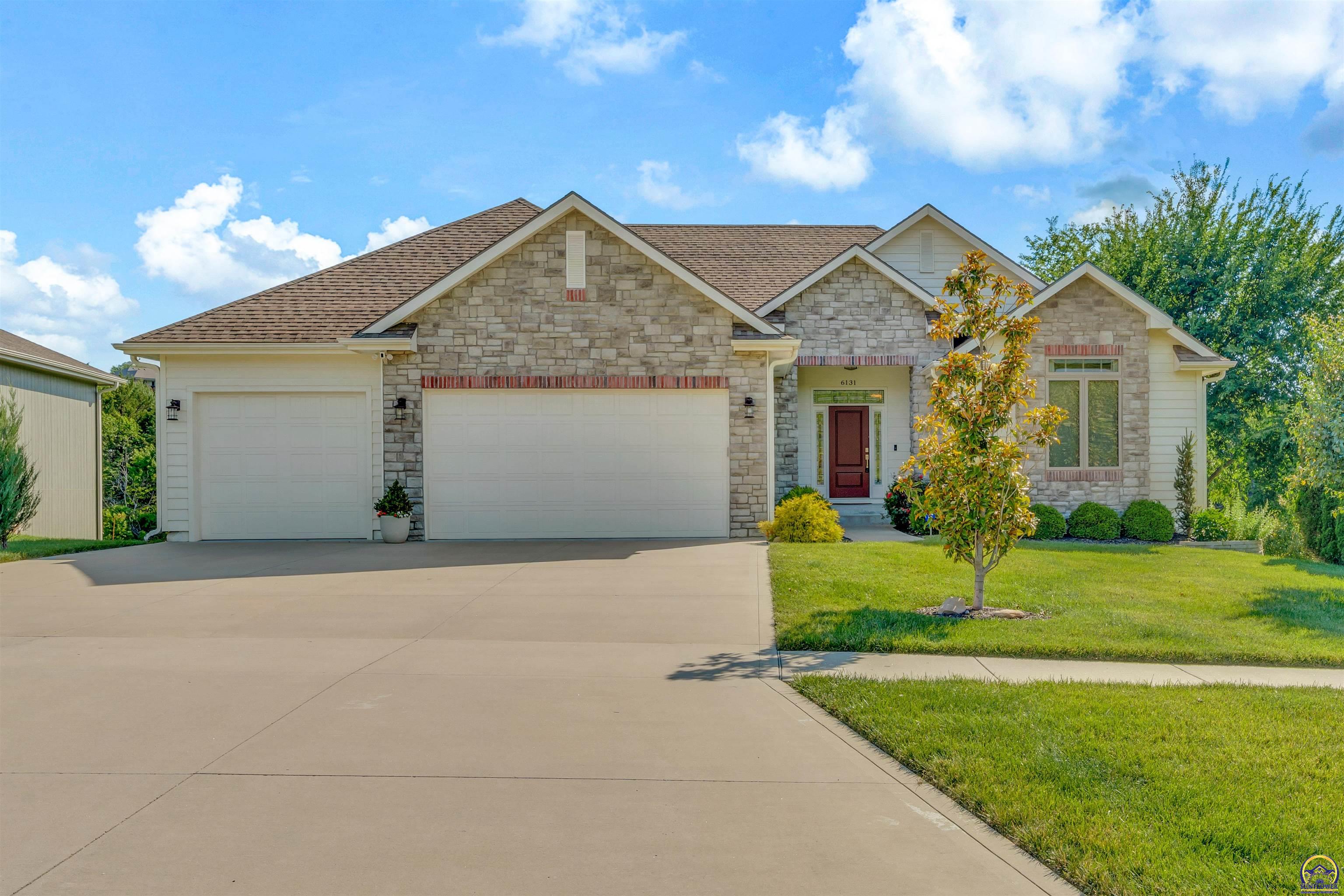 6131 Southwest 47th Street Topeka, KS 66610 - Photo 1 of 20 Front of Home