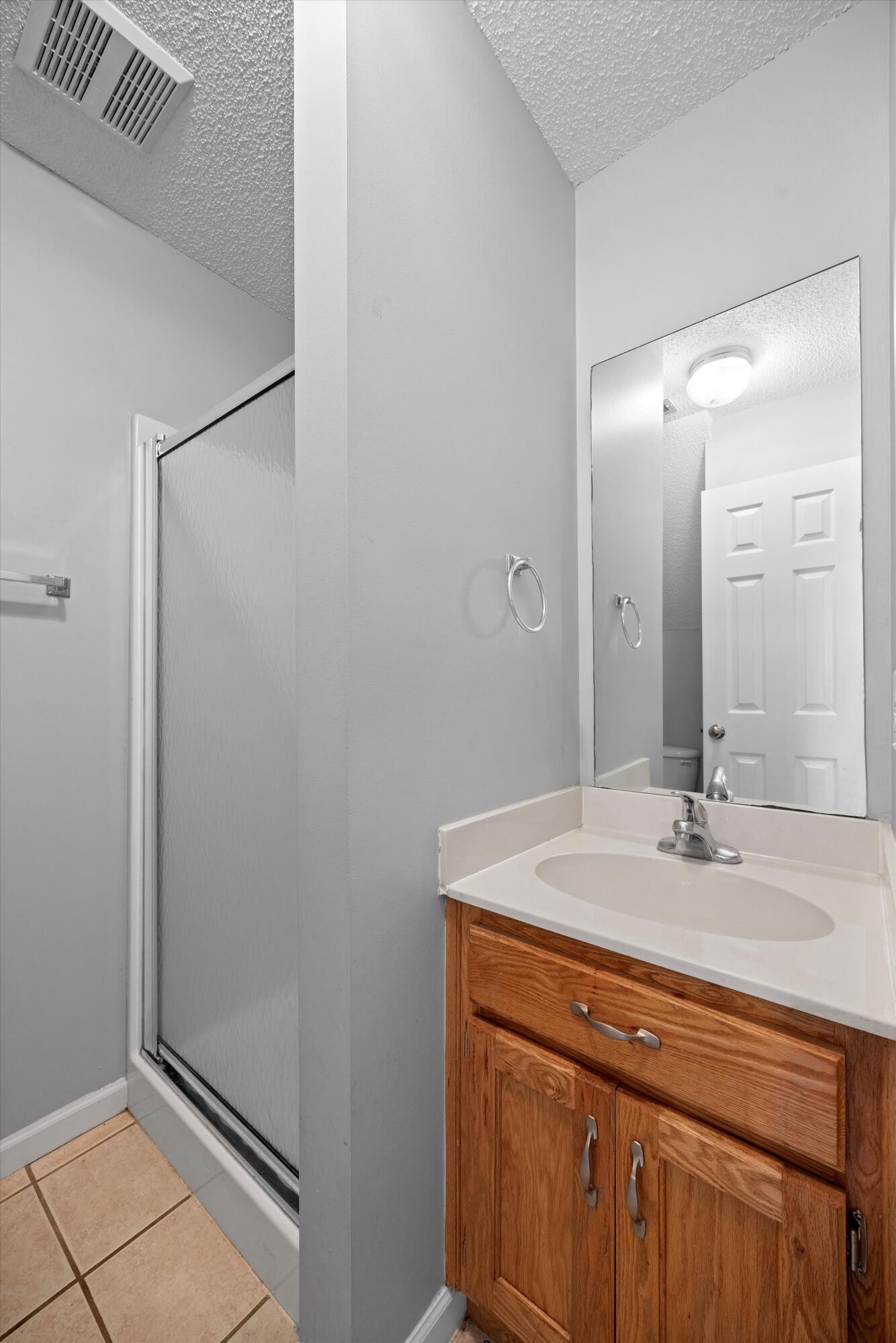 155 Priscilla Drive Ringgold, GA 30736 - Photo 15 of 19 a bathroom with a sink and a mirror