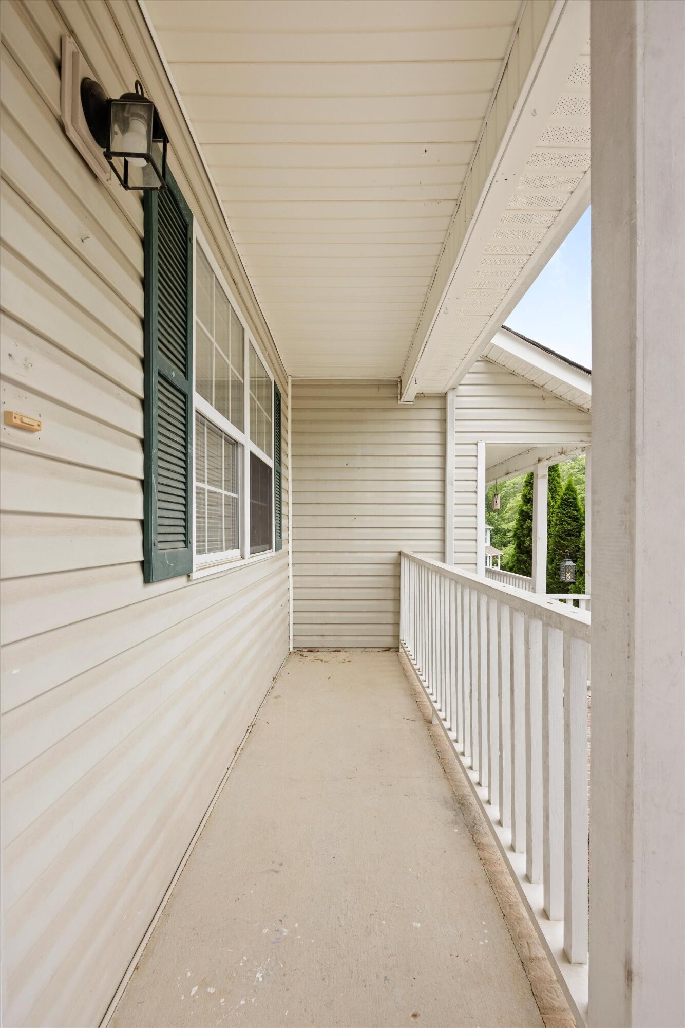 155 Priscilla Drive Ringgold, GA 30736 - Photo 4 of 19 a view of a porch with wooden floor and stairs