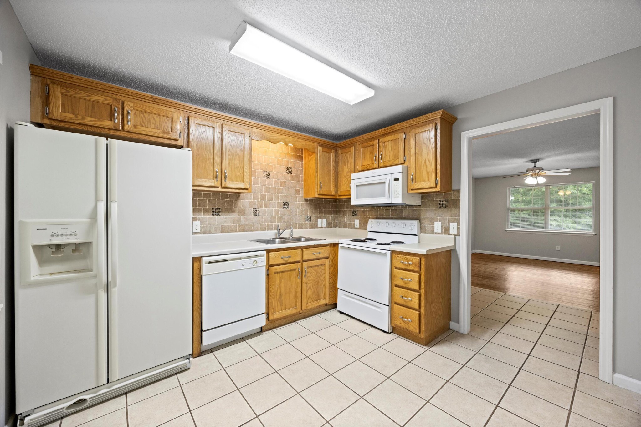155 Priscilla Drive Ringgold, GA 30736 - Photo 8 of 19 a kitchen with stainless steel appliances granite countertop a refrigerator and a stove top oven