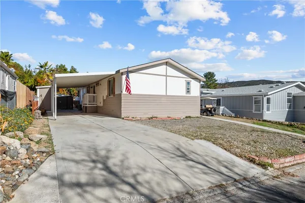 a view of a house with a patio