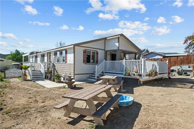 a view of a deck with a yard