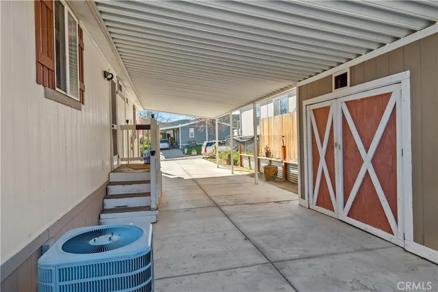 a view of a street with a park